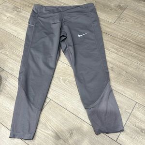 Nike capris with mesh design at bottom